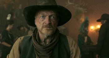 Movie still from “The Ballad of Buster Scruggs” (2018), directed by Joel Coen – Close Up shot, Over the shoulder angle