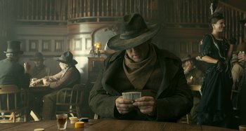 Movie still from “The Ballad of Buster Scruggs” (2018), directed by Joel Coen – Medium shot, Over the shoulder angle