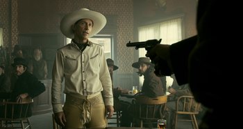 Movie still from “The Ballad of Buster Scruggs” (2018), directed by Joel Coen – Medium shot, Over the shoulder angle