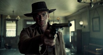 Movie still from “The Ballad of Buster Scruggs” (2018), directed by Joel Coen – Medium shot, Low angle