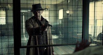 Movie still from “The Ballad of Buster Scruggs” (2018), directed by Joel Coen – Medium shot, Over the shoulder angle