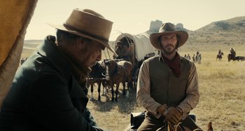 Movie still from “The Ballad of Buster Scruggs” (2018), directed by Joel Coen – Medium shot, Over the shoulder angle