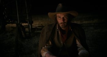 Movie still from “The Ballad of Buster Scruggs” (2018), directed by Joel Coen – Medium shot, Over the shoulder angle