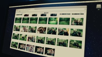 Movie still from “Mr. Robot” (2015), created by Sam Esmail – A computer screen with a bunch of pictures on it; Extreme Close Up shot, High angle