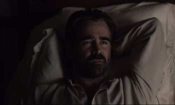 Movie still from “The Beguiled” (2017), directed by Sofia Coppola – A man laying in a bed with his head on a pillow; Close Up shot, High angle