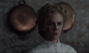 Movie still from “The Beguiled” (2017), directed by Sofia Coppola – A person wearing a white shirt; Close Up shot, Over the shoulder angle