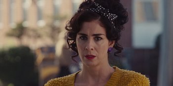 Movie still from “The Book of Henry” (2017), directed by Colin Trevorrow – A person wearing a yellow sweater; Close Up shot, Over the shoulder angle