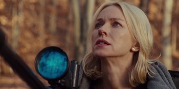Movie still from “The Book of Henry” (2017), directed by Colin Trevorrow – A woman looking up at the sky through a telescope; Close Up shot, Low angle