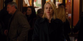 Movie still from “The Book of Henry” (2017), directed by Colin Trevorrow – A woman with blonde hair wearing a black coat; Medium shot, Over the shoulder angle