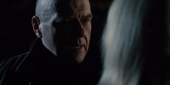 Movie still from “The Book of Henry” (2017), directed by Colin Trevorrow – An older man with a bald head looking at a young woman; Close Up shot, Over the shoulder angle