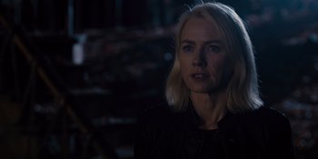 Movie still from “The Book of Henry” (2017), directed by Colin Trevorrow – A woman with blonde hair is looking at the camera; Close Up shot, Over the shoulder angle
