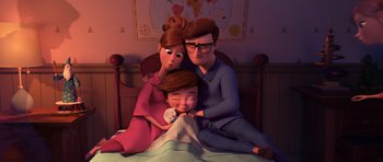 Movie still from “The Boss Baby” (2017), directed by Tom McGrath – A cartoon of a man , woman , and a child sitting on a bed; Medium shot, High angle