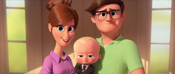 Movie still from “The Boss Baby” (2017), directed by Tom McGrath – A family is posing for a picture in the movie the boss baby; Medium shot, High angle
