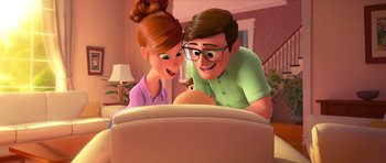 Movie still from “The Boss Baby” (2017), directed by Tom McGrath – An animated man and a woman looking at a basketball; Medium shot, Over the shoulder angle