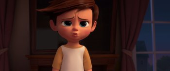Movie still from “The Boss Baby” (2017), directed by Tom McGrath – A cartoon of a young boy with brown hair and blue eyes looking sad; Close Up shot, High angle