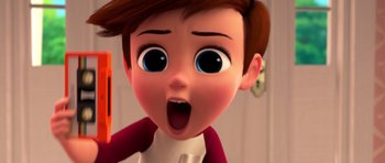 Movie still from “The Boss Baby” (2017), directed by Tom McGrath – A boy's face with a surprised look on his face; Extreme Close Up shot, Over the shoulder angle