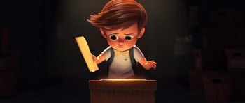 Movie still from “The Boss Baby” (2017), directed by Tom McGrath – A cartoon of a little boy holding a piece of paper; Medium shot, High angle