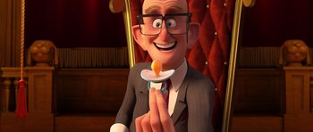 Movie still from “The Boss Baby” (2017), directed by Tom McGrath – An animated man holding a pacifier in his mouth; Close Up shot, Over the shoulder angle