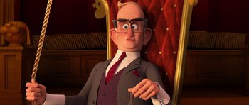 Movie still from “The Boss Baby” (2017), directed by Tom McGrath – An animated man in a suit and tie holding a necklace; Close Up shot, High angle