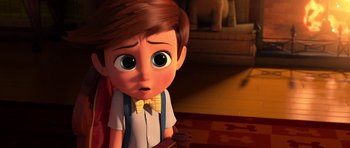 Movie still from “The Boss Baby” (2017), directed by Tom McGrath – A cartoon of a little boy with a bow tie; Close Up shot, Over the shoulder angle