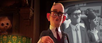 Movie still from “The Boss Baby” (2017), directed by Tom McGrath – An animated man in a suit and tie; Close Up shot, Over the shoulder angle