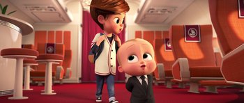 Movie still from “The Boss Baby” (2017), directed by Tom McGrath – A cartoon of a boy standing next to a baby; Medium shot, Over the shoulder angle