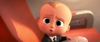 Movie still from “The Boss Baby” (2017), directed by Tom McGrath – A cartoon baby boy wearing a suit and tie; Close Up shot, High angle