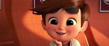 Movie still from “The Boss Baby” (2017), directed by Tom McGrath – A cartoon boy's face with his hand under his chin; Extreme Close Up shot, Low angle