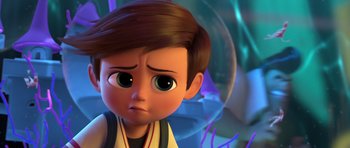 Movie still from “The Boss Baby” (2017), directed by Tom McGrath – A cartoon boy with brown hair looking sad; Close Up shot, Over the shoulder angle