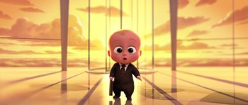 Movie still from “The Boss Baby” (2017), directed by Tom McGrath – A cartoon baby in a business suit holding a briefcase in front of a window; Medium shot, High angle