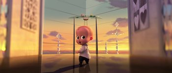 Movie still from “The Boss Baby” (2017), directed by Tom McGrath – An animated character standing in front of a sky background; Wide shot, Low angle