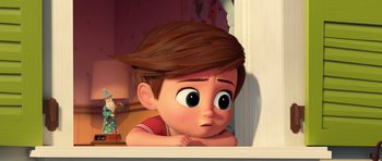 Movie still from “The Boss Baby” (2017), directed by Tom McGrath – A cartoon of a little boy with brown hair looking sad; Close Up shot, Over the shoulder angle