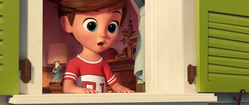 Movie still from “The Boss Baby” (2017), directed by Tom McGrath – A cartoon of a boy looking out of a window; Medium shot, High angle