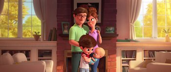 Movie still from “The Boss Baby” (2017), directed by Tom McGrath – An animated family is standing in front of a fireplace; Wide shot, High angle