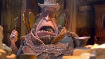 Movie still from “The Boxtrolls” (2014), directed by Anthony Stacchi – A statue of a man with a hat on; Close Up shot, Low angle