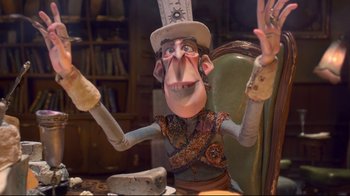 Movie still from “The Boxtrolls” (2014), directed by Anthony Stacchi – A toy character with arms raised; Medium shot, Over the shoulder angle