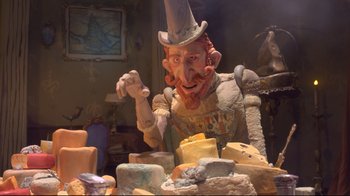Movie still from “The Boxtrolls” (2014), directed by Anthony Stacchi – A statue of a man with a hat on; Medium shot, Over the shoulder angle