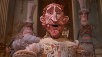 Movie still from “The Boxtrolls” (2014), directed by Anthony Stacchi – A statue of a man with a mustache; Close Up shot, Low angle