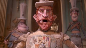 Movie still from “The Boxtrolls” (2014), directed by Anthony Stacchi – A statue of a man with a mustache; Close Up shot, Low angle