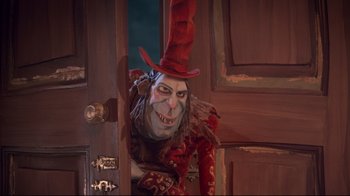 Movie still from “The Boxtrolls” (2014), directed by Anthony Stacchi – A person wearing a costume near a door; Medium shot, Over the shoulder angle