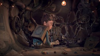 Movie still from “The Boxtrolls” (2014), directed by Anthony Stacchi – A boy is sitting on the ground with a television strapped to his back; Wide shot, Low angle
