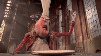 Movie still from “The Boxtrolls” (2014), directed by Anthony Stacchi – An animated character in a red and white outfit is eating food; Close Up shot, Low angle