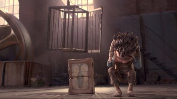 Movie still from “The Boxtrolls” (2014), directed by Anthony Stacchi – An animated creature standing in front of a cage; Wide shot, Low angle
