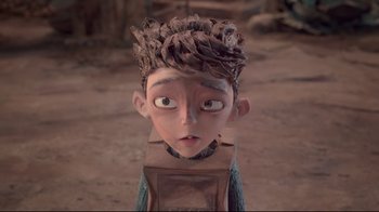 Movie still from “The Boxtrolls” (2014), directed by Anthony Stacchi – The head of a cartoon character; Close Up shot, Over the shoulder angle