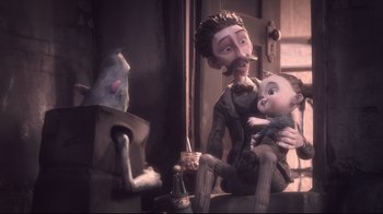 Movie still from “The Boxtrolls” (2014), directed by Anthony Stacchi – A man holding a child in his arms; Medium shot, Over the shoulder angle