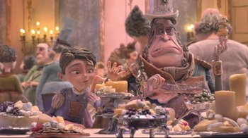 Movie still from “The Boxtrolls” (2014), directed by Anthony Stacchi – A man and a boy sitting at a table with food; Medium shot, Over the shoulder angle