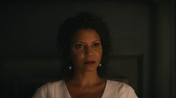 Movie still from “Mr. Robot” (2015), created by Sam Esmail – A person wearing a white shirt; Close Up shot, Low angle