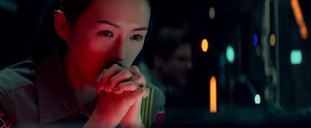 Movie still from “The Cloverfield Paradox” (2018), directed by Julius Onah – A woman with her hands over her mouth; Close Up shot, Over the shoulder angle