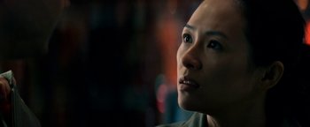Movie still from “The Cloverfield Paradox” (2018), directed by Julius Onah – A woman's face in the dark; Close Up shot, Over the shoulder angle