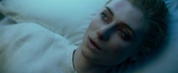 Movie still from “The Cloverfield Paradox” (2018), directed by Julius Onah – A woman's face in a white shirt; Close Up shot, Overhead angle